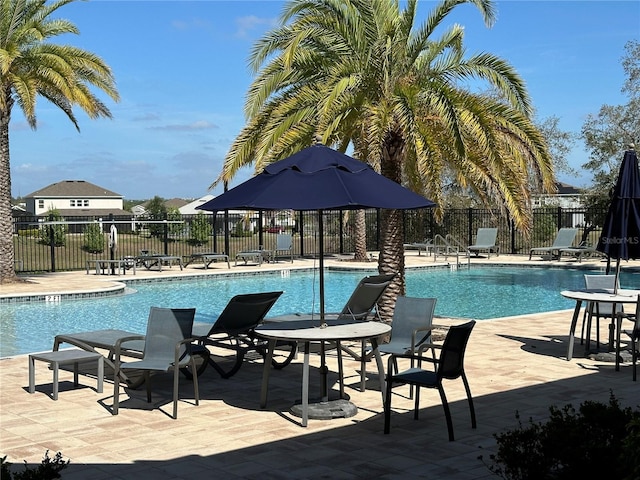 3399 Buoy Cir, Winter Garden, FL 34787 - pool featuring fence and a patio area