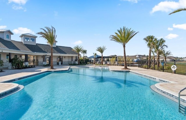 3399 Buoy Cir, Winter Garden, FL 34787 - community pool with fence and a patio