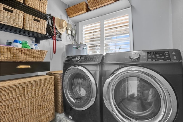 5205 Saint Regis Pl, Belle Isle, FL 32812 - laundry room featuring independent washer and dryer and laundry area