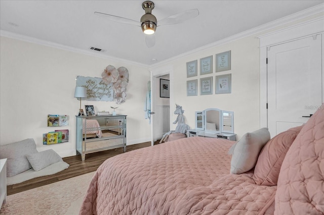 5205 Saint Regis Pl, Belle Isle, FL 32812 - bedroom featuring visible vents, baseboards, a ceiling fan, crown molding, and wood finished floors