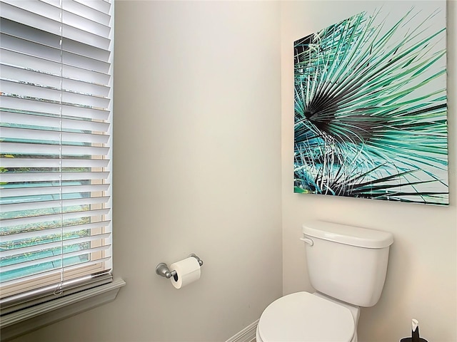 9432 Komika Ln, Winter Garden, FL 34787 - bathroom featuring toilet and baseboards