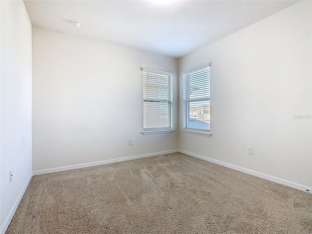 9432 Komika Ln, Winter Garden, FL 34787 - unfurnished room with light carpet and baseboards