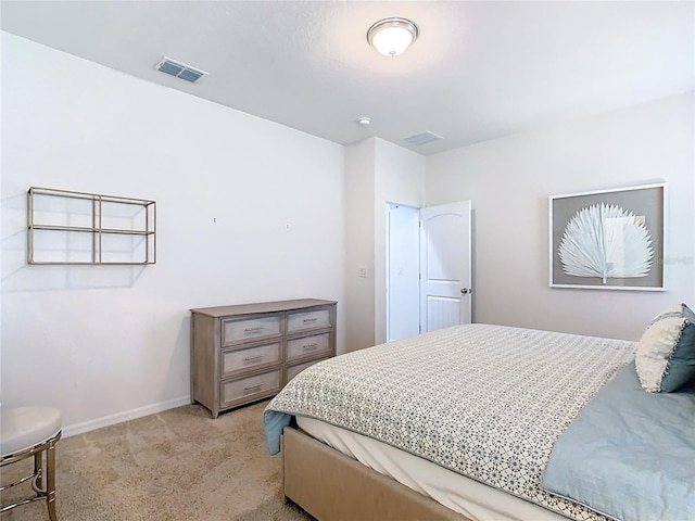9432 Komika Ln, Winter Garden, FL 34787 - bedroom with light carpet, baseboards, and visible vents
