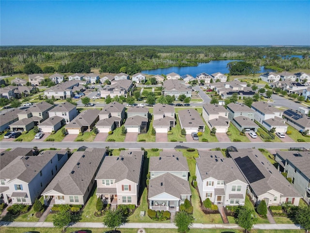 9432 Komika Ln, Winter Garden, FL 34787 - aerial view featuring a wooded view, a water view, and a residential view