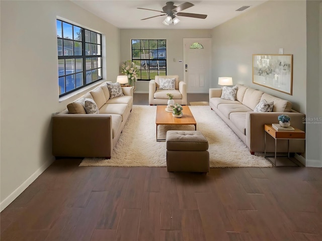 701 71st Ave N, Saint Petersburg, FL 33702 - living room featuring wood finished floors, ceiling fan, and baseboards
