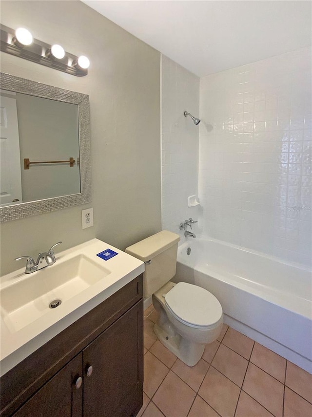 701 71st Ave N, Saint Petersburg, FL 33702 - full bathroom featuring toilet, tub / shower combination, vanity, and tile patterned floors