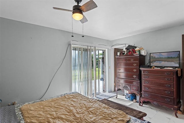 bedroom with access to exterior and ceiling fan