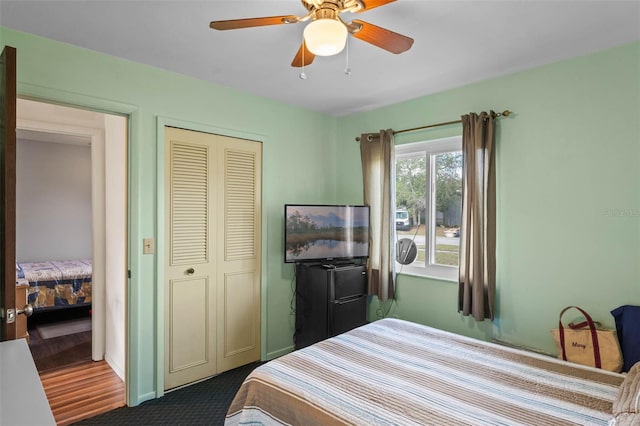 bedroom featuring a closet and ceiling fan