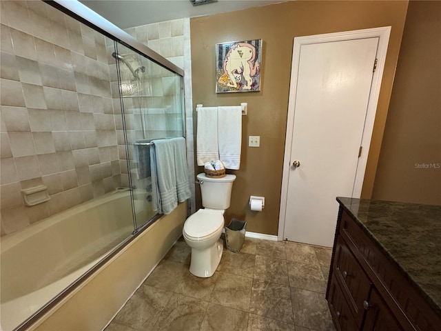 913 Red Fox Rd, Altamonte Springs, FL 32714 - bathroom with baseboards, bath / shower combo with glass door, toilet, and vanity