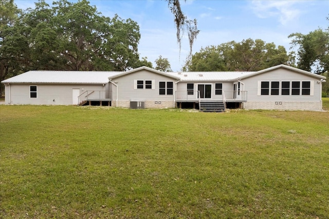 10809 Cedar Cove Dr, Thonotosassa, FL 33592 - back of house with a yard and a wooden deck