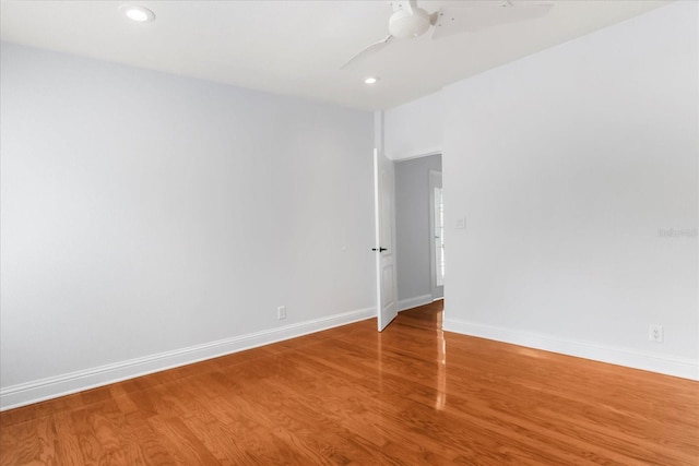 10809 Cedar Cove Dr, Thonotosassa, FL 33592 - spare room featuring wood finished floors, ceiling fan, baseboards, and recessed lighting