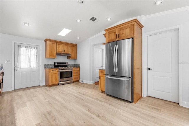 10809 Cedar Cove Dr, Thonotosassa, FL 33592 - kitchen featuring light stone counters, under cabinet range hood, visible vents, stainless steel appliances, and light wood finished floors