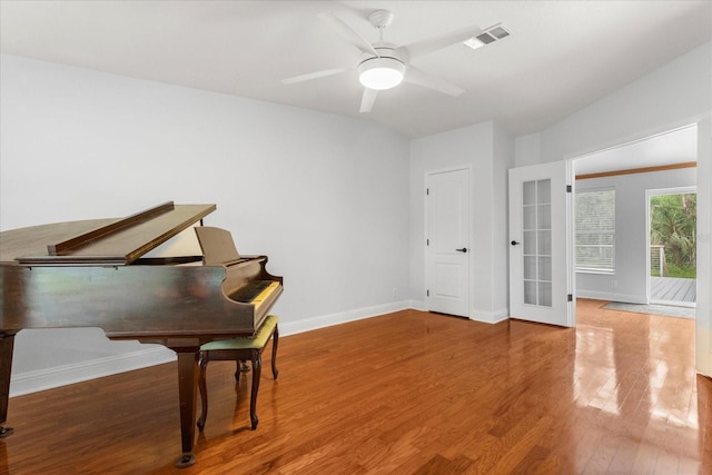 10809 Cedar Cove Dr, Thonotosassa, FL 33592 - living area with light wood-style flooring, ceiling fan, baseboards, and visible vents