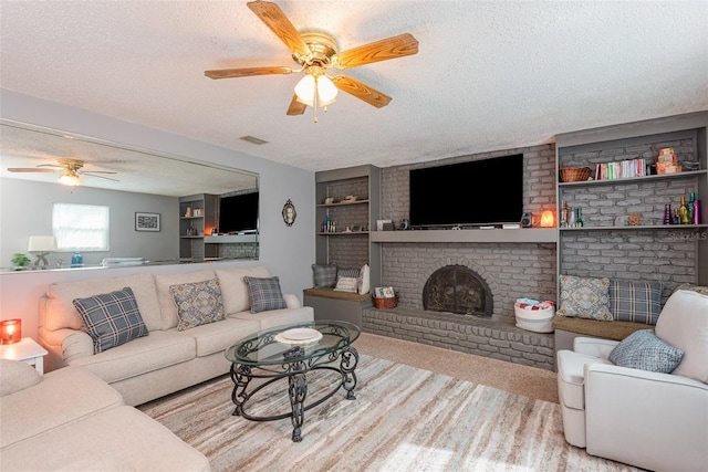 4520 Browning Ave, Titusville, FL 32780 - carpeted living room featuring a textured ceiling, a ceiling fan, and visible vents