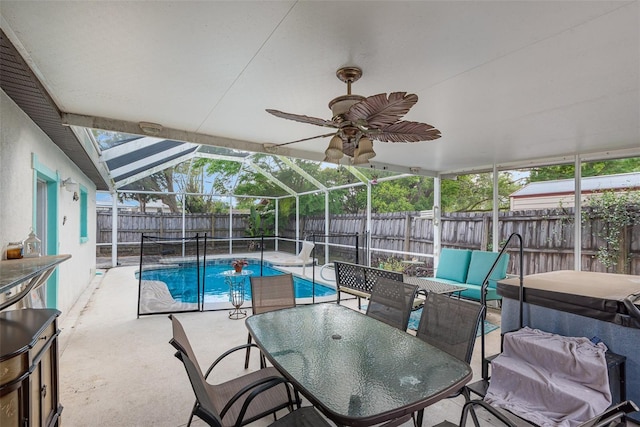 4520 Browning Ave, Titusville, FL 32780 - view of swimming pool with a patio area, a ceiling fan, a fenced backyard, glass enclosure, and a fenced in pool