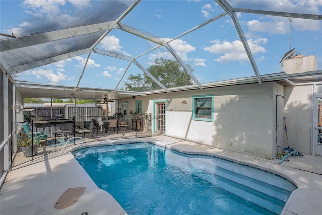 4520 Browning Ave, Titusville, FL 32780 - outdoor pool featuring a patio area, fence, and glass enclosure