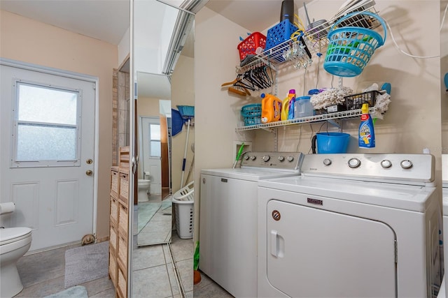 4520 Browning Ave, Titusville, FL 32780 - laundry area featuring light tile patterned floors and washing machine and dryer