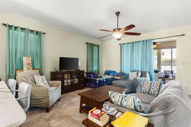 living room with light tile patterned floors and a ceiling fan