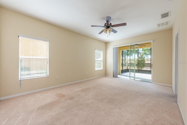 3205 Sonesta Ct Unit F, Clermont, FL 34711 - carpeted empty room featuring baseboards, visible vents, and a ceiling fan
