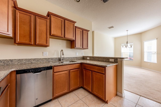 3205 Sonesta Ct Unit F, Clermont, FL 34711 - kitchen featuring a chandelier, dishwasher, brown cabinets, a sink, and light colored carpet