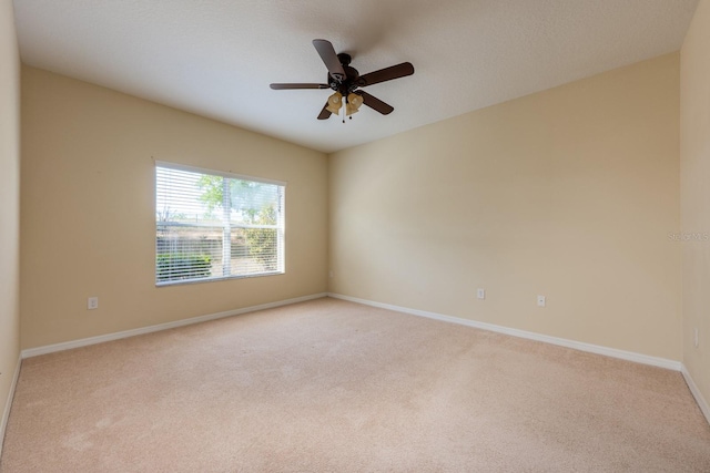3205 Sonesta Ct Unit F, Clermont, FL 34711 - unfurnished room with baseboards, carpet flooring, and a ceiling fan