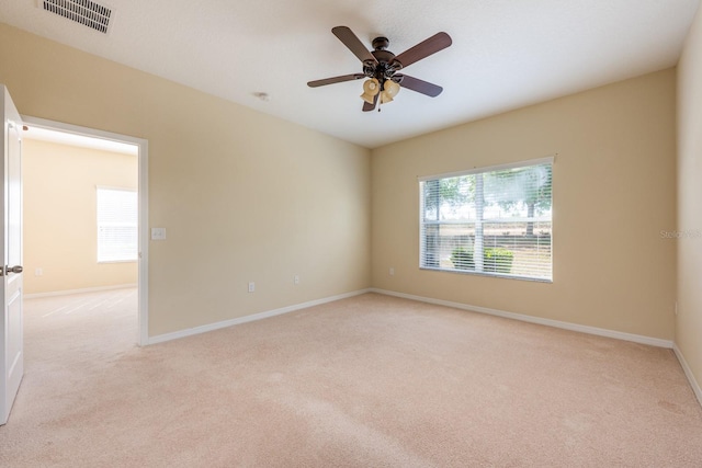 3205 Sonesta Ct Unit F, Clermont, FL 34711 - empty room featuring baseboards, ceiling fan, visible vents, and light colored carpet