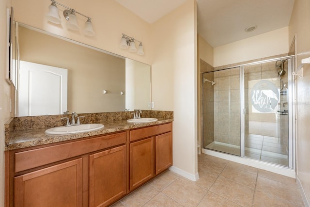 3205 Sonesta Ct Unit F, Clermont, FL 34711 - bathroom with a stall shower, double vanity, tile patterned flooring, and a sink
