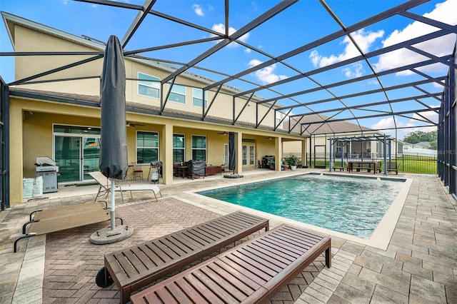 1802 Candlenut Cir, Apopka, FL 32712 - pool featuring grilling area, a patio, ceiling fan, and glass enclosure