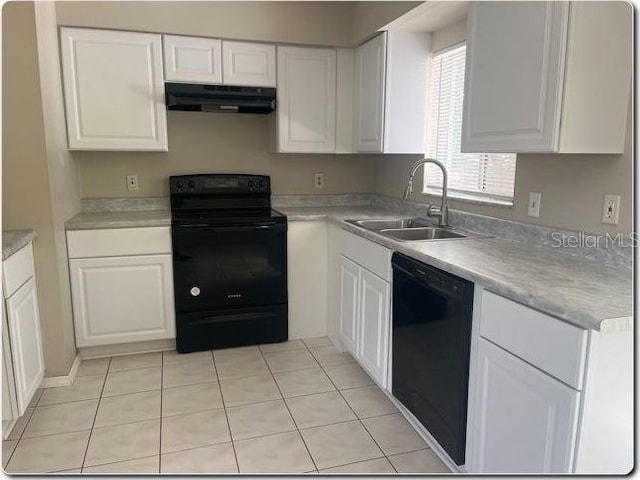 kitchen featuring a sink, light countertops, black appliances, under cabinet range hood, and white cabinetry