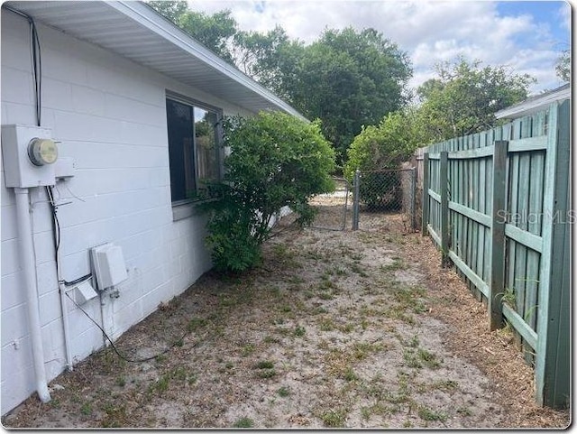 view of yard featuring fence