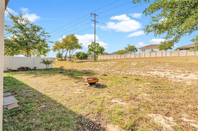 view of yard with fence