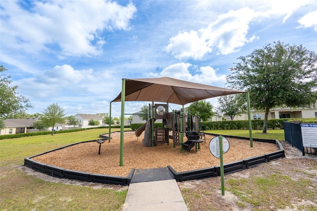 communal playground with a lawn