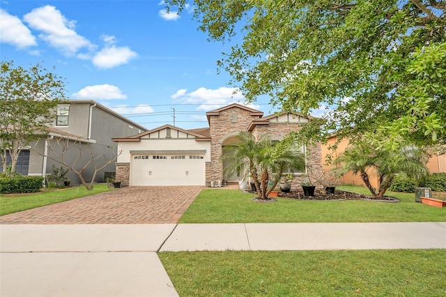 view of front of home with stucco siding, decorative driveway, stone siding, a front lawn, and an attached garage