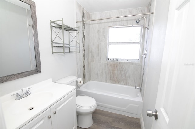 1831 Aaron Ave, Orlando, FL 32811 - full bathroom featuring tub / shower combination, toilet, vanity, and wood finished floors