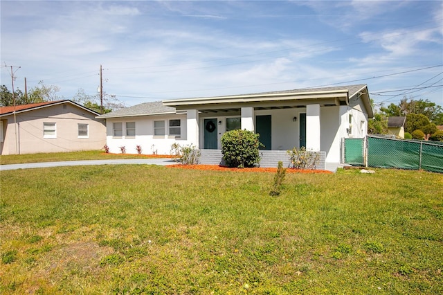 1831 Aaron Ave, Orlando, FL 32811 - ranch-style house featuring a front yard, stucco siding, and fence