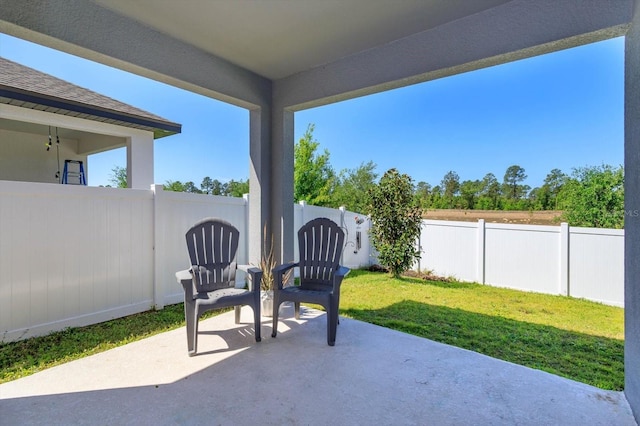 view of patio with a fenced backyard