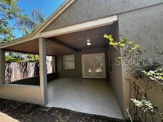 property entrance featuring french doors