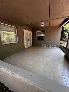 view of patio featuring french doors
