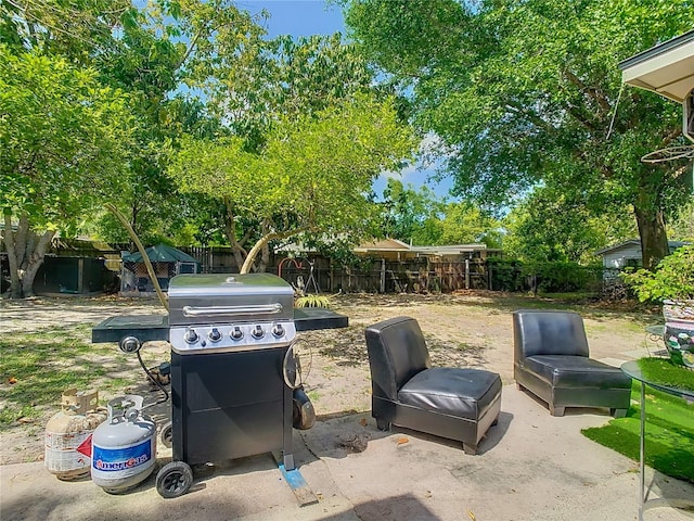 view of yard with a patio and fence