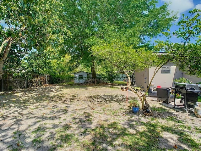 view of yard featuring fence
