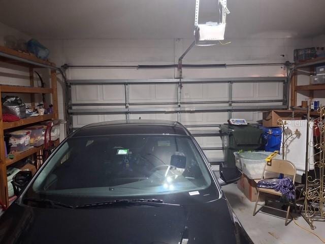 450 Morning Blossom Ln, Oviedo, FL 32765 - garage featuring a garage door opener