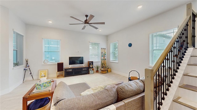 13241 Cormack Ln, Orlando, FL 32827 - living room with plenty of natural light, stairs, recessed lighting, and a ceiling fan