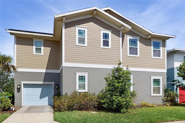 13241 Cormack Ln, Orlando, FL 32827 - view of front facade with stucco siding, a garage, and concrete driveway