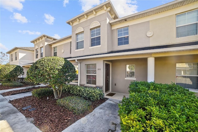 townhome / multi-family property with stucco siding