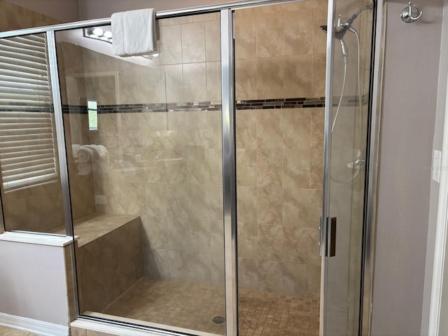 bathroom featuring a stall shower