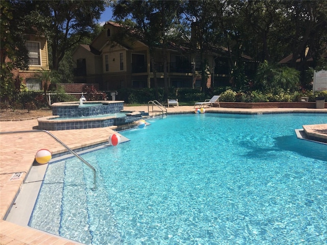 pool with a hot tub