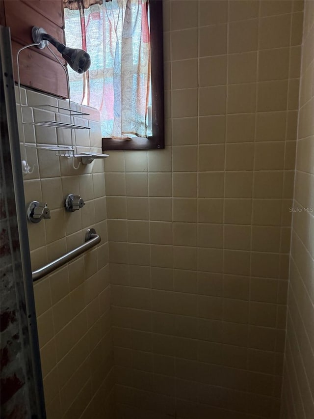 bathroom featuring a stall shower
