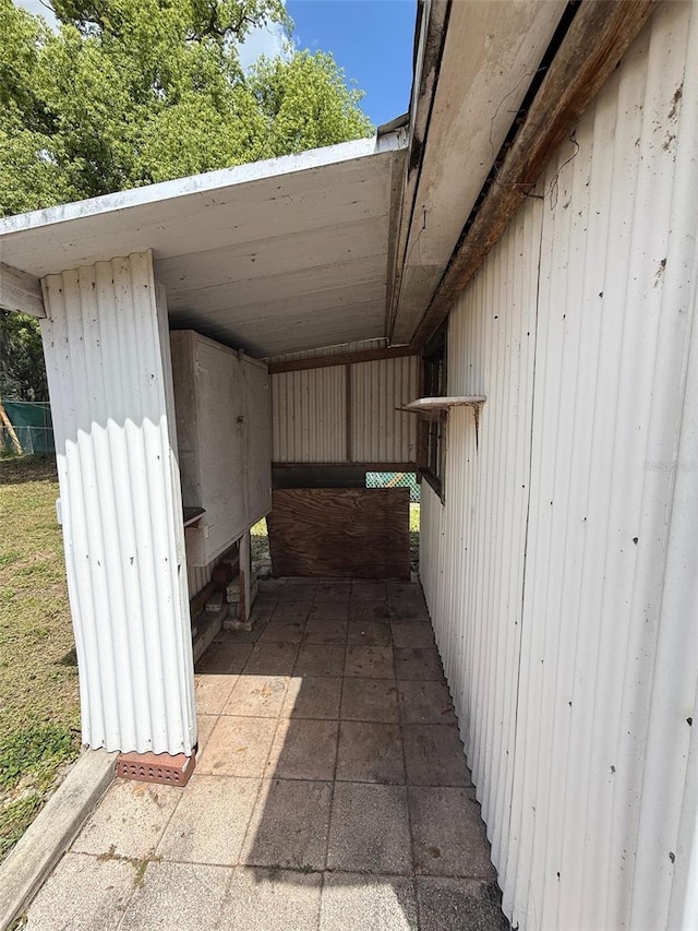 exterior space with a carport