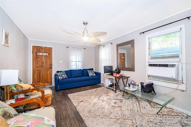 1204 34th St, Orlando, FL 32805 - living area featuring dark wood-style floors, cooling unit, and a ceiling fan