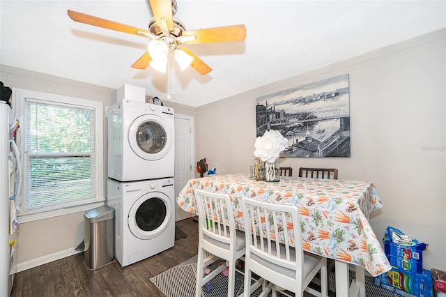 1204 34th St, Orlando, FL 32805 - clothes washing area with baseboards, ceiling fan, laundry area, stacked washer / drying machine, and wood finished floors